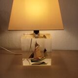 Boat lamp integrated into the base