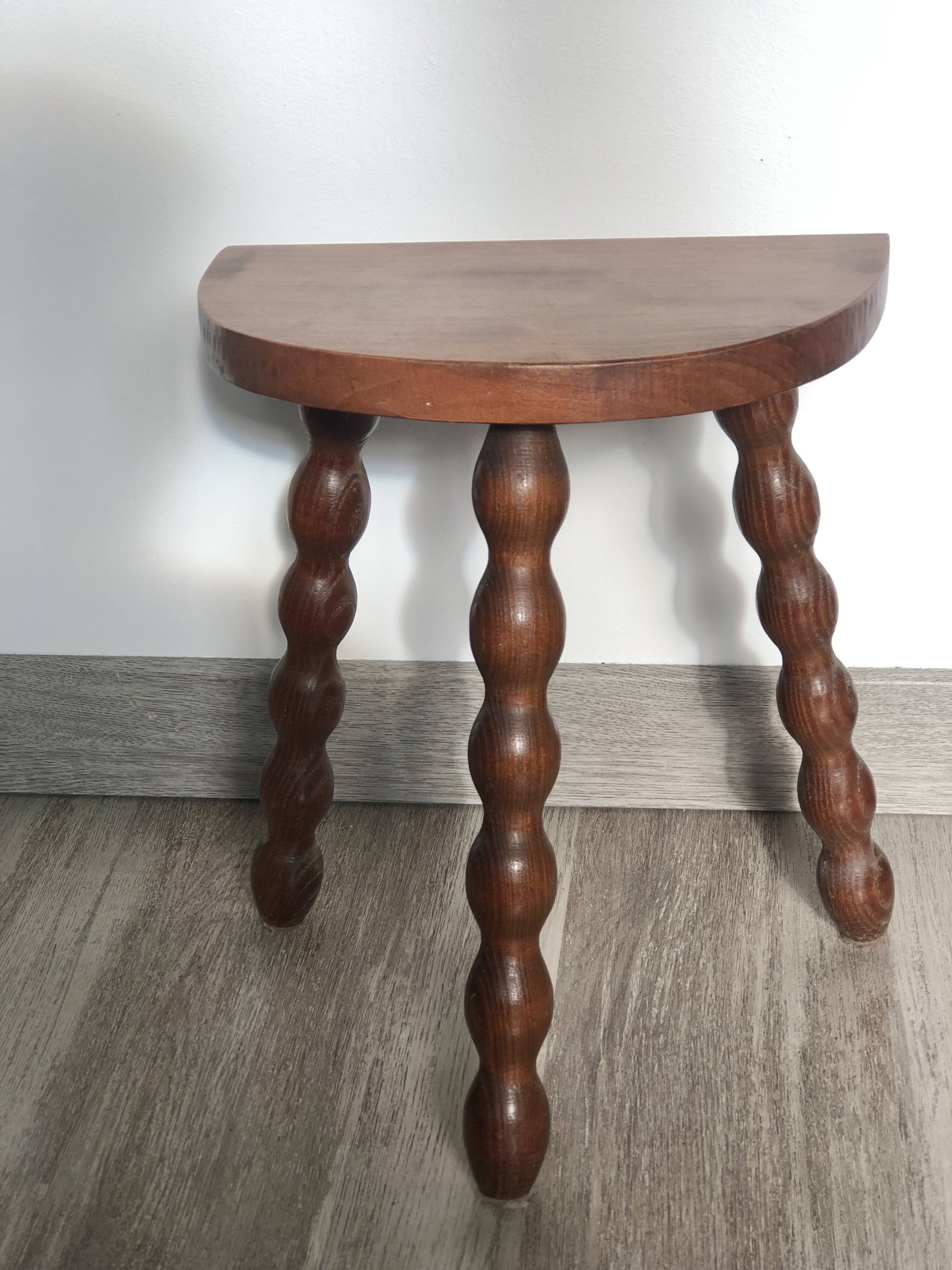 Turned wooden tripod stool