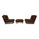 2 armchairs and 1 ottoman in brushed aluminium and brown leather, France 1970