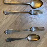 Two sets of silver-plated cutlery.