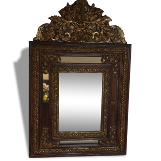 Mirror parecloses wood and metal pushed back