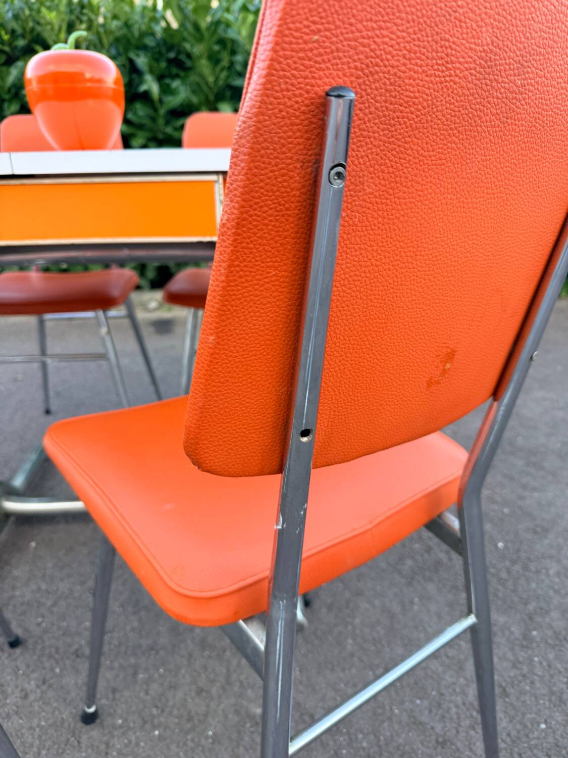 Formica leatherette chair with orange table, vintage 70s Space Age
