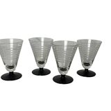 Art Deco, four striped liqueur glasses on black stem circa 1930