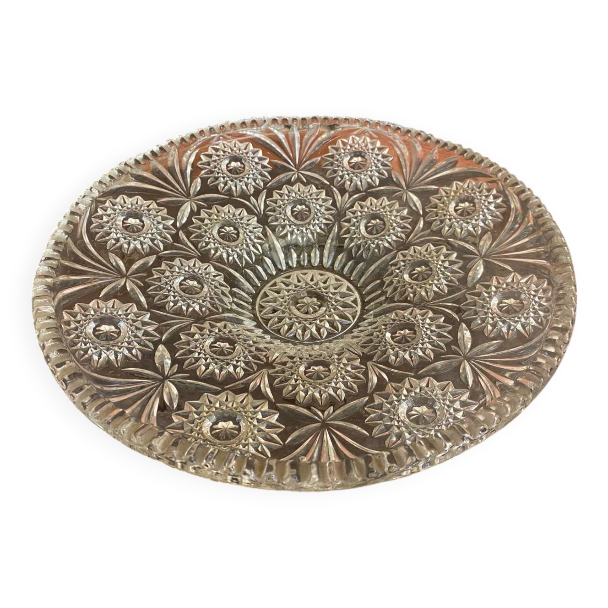 Cut glass fruit bowl with carved star decoration.