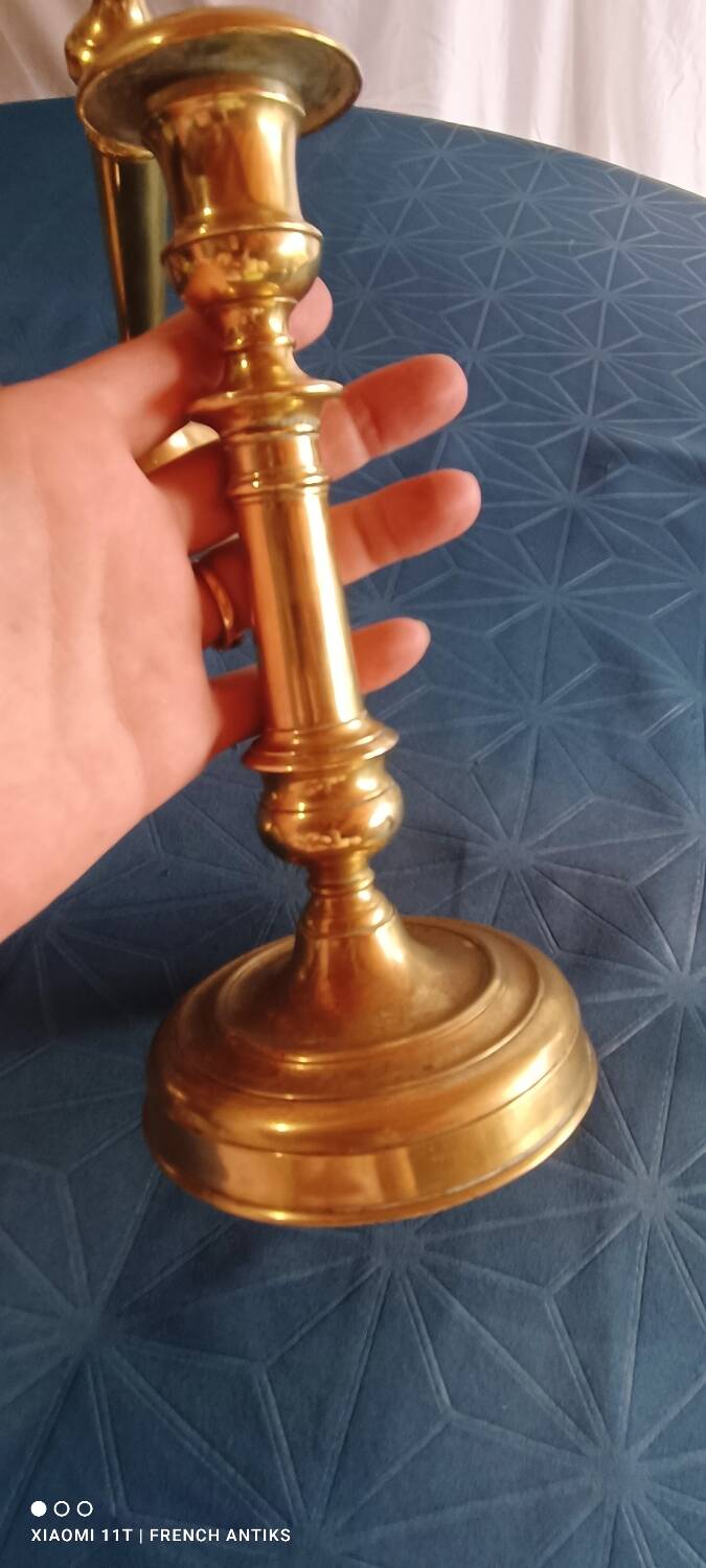 Bronze candlestick or torch holder from the Louis XIV period, France, 17th century.