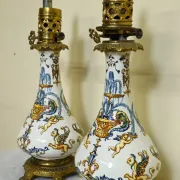 Gien: pair of antique oil lamps in fine earthenware richly decorated.