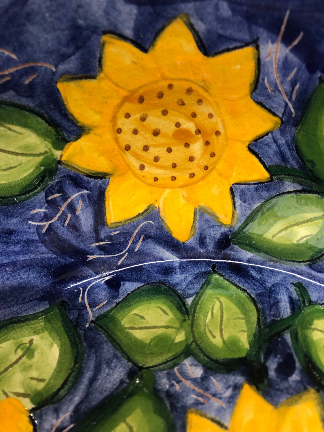 Portuguese ceramic dish decorated with sunflowers