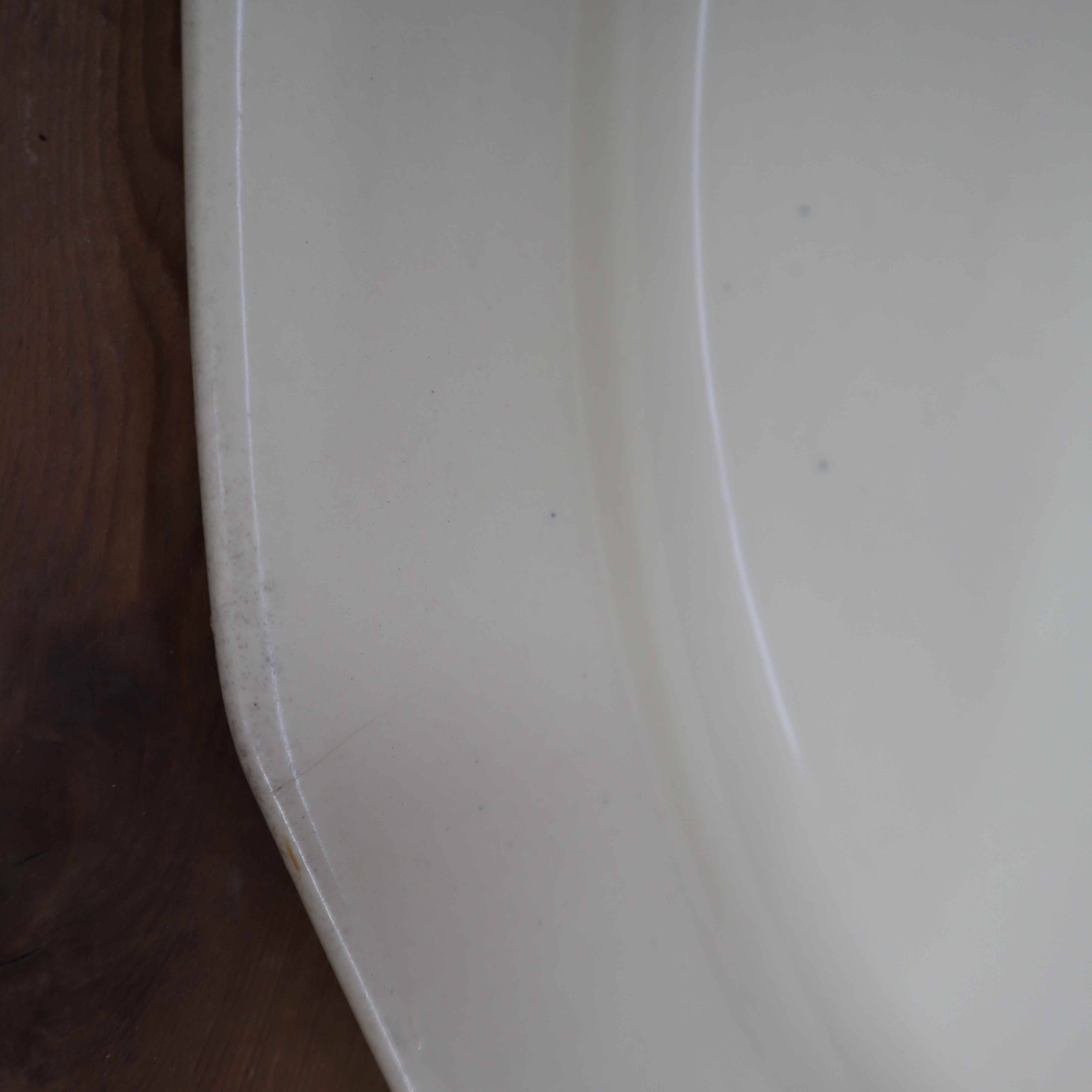 Oval octagonal dish in ecru white earthenware Moulin des Loups