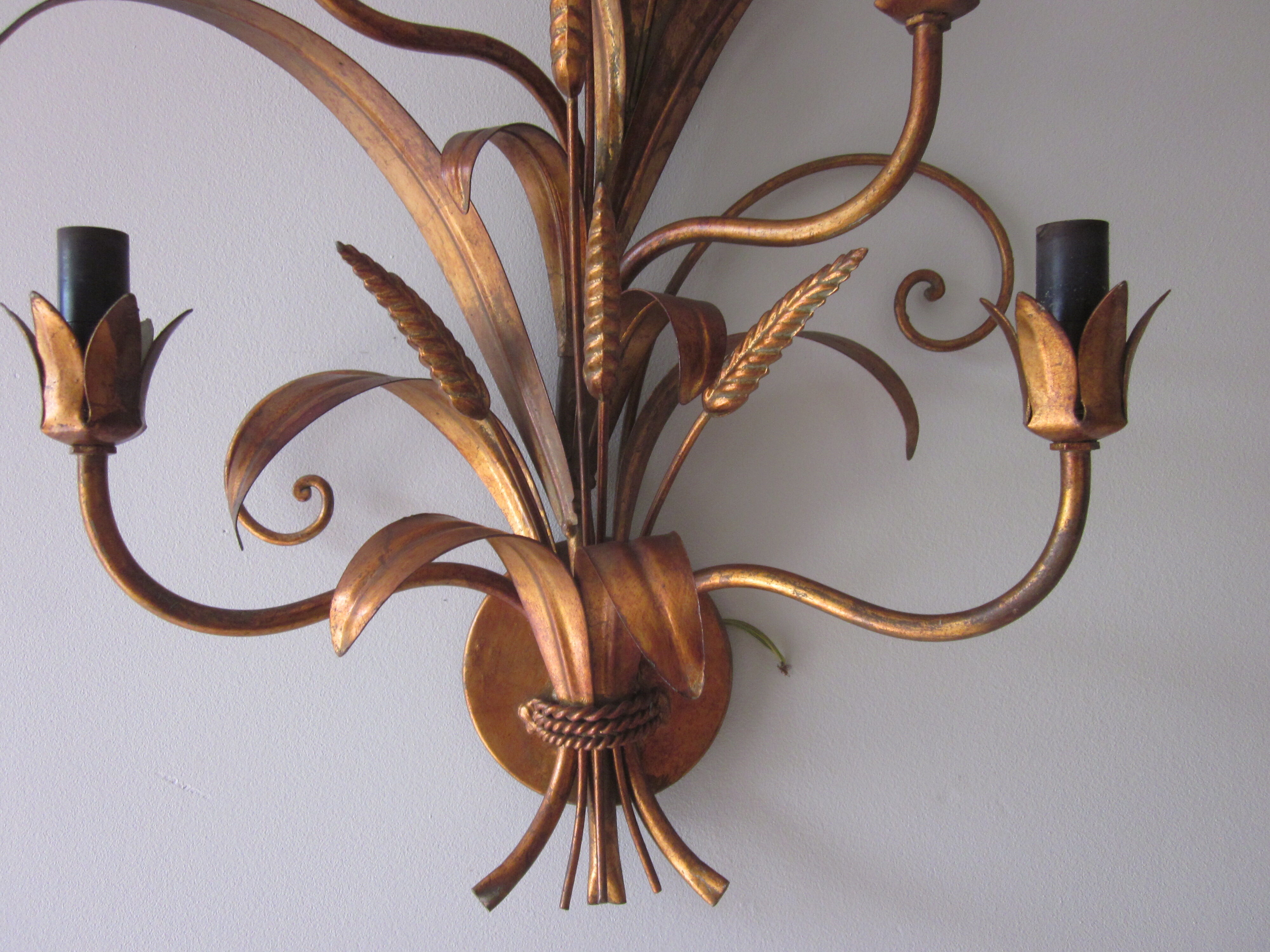 Sconce in gilded metal