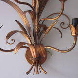Sconce in gilded metal
