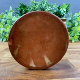 Antique ceramic pot with hand-painted floral decoration.