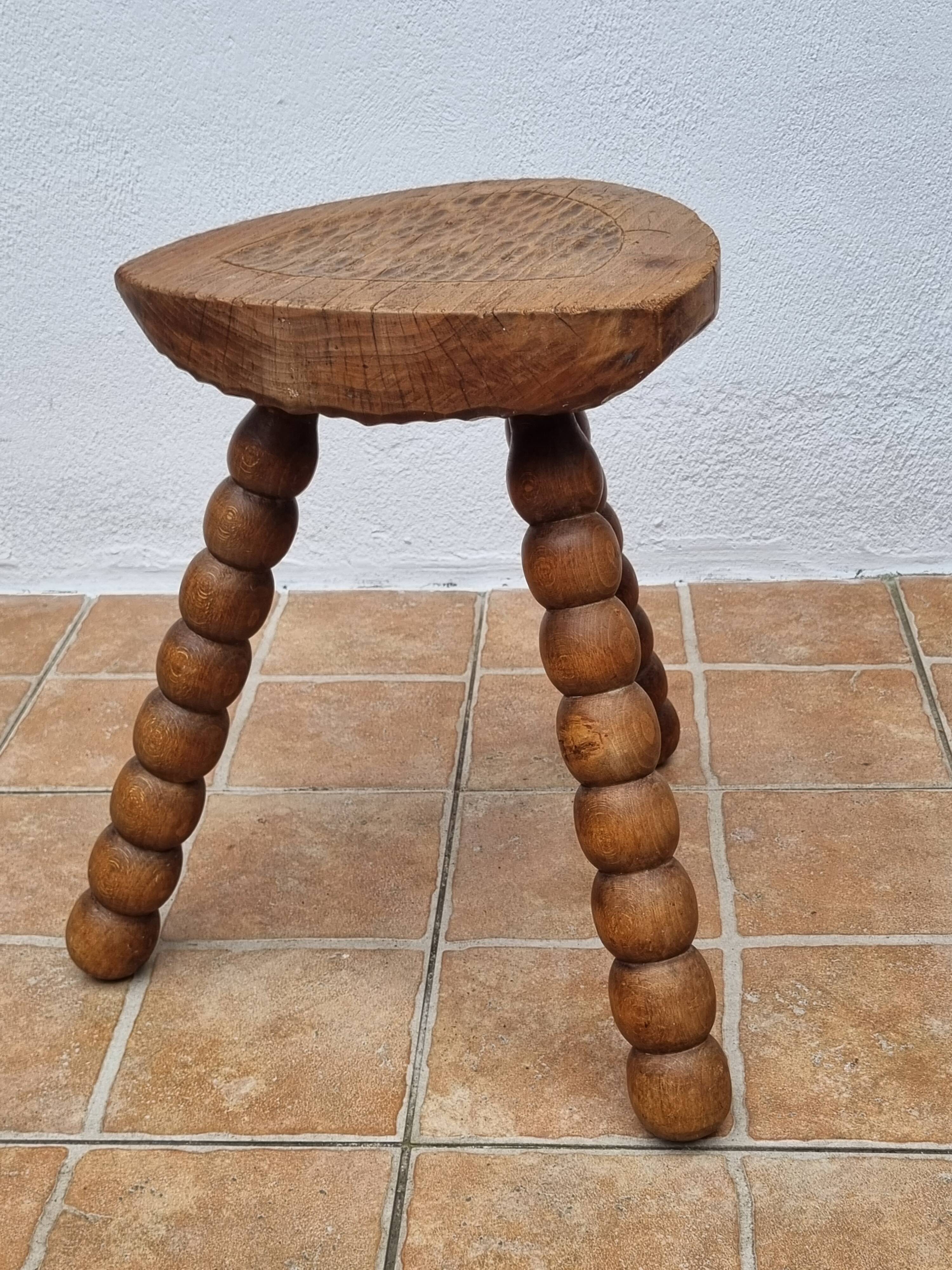 Rustic solid wood tripod stool with turned legs, 45 cm high