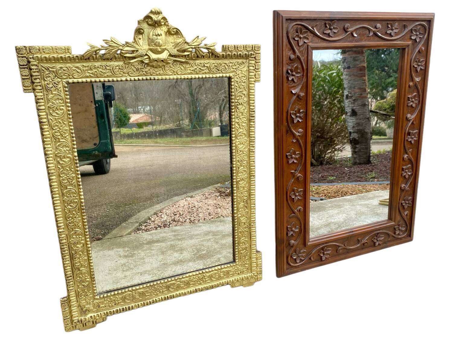 Two antique 19th century mirrors in carved Napoleon oak wood