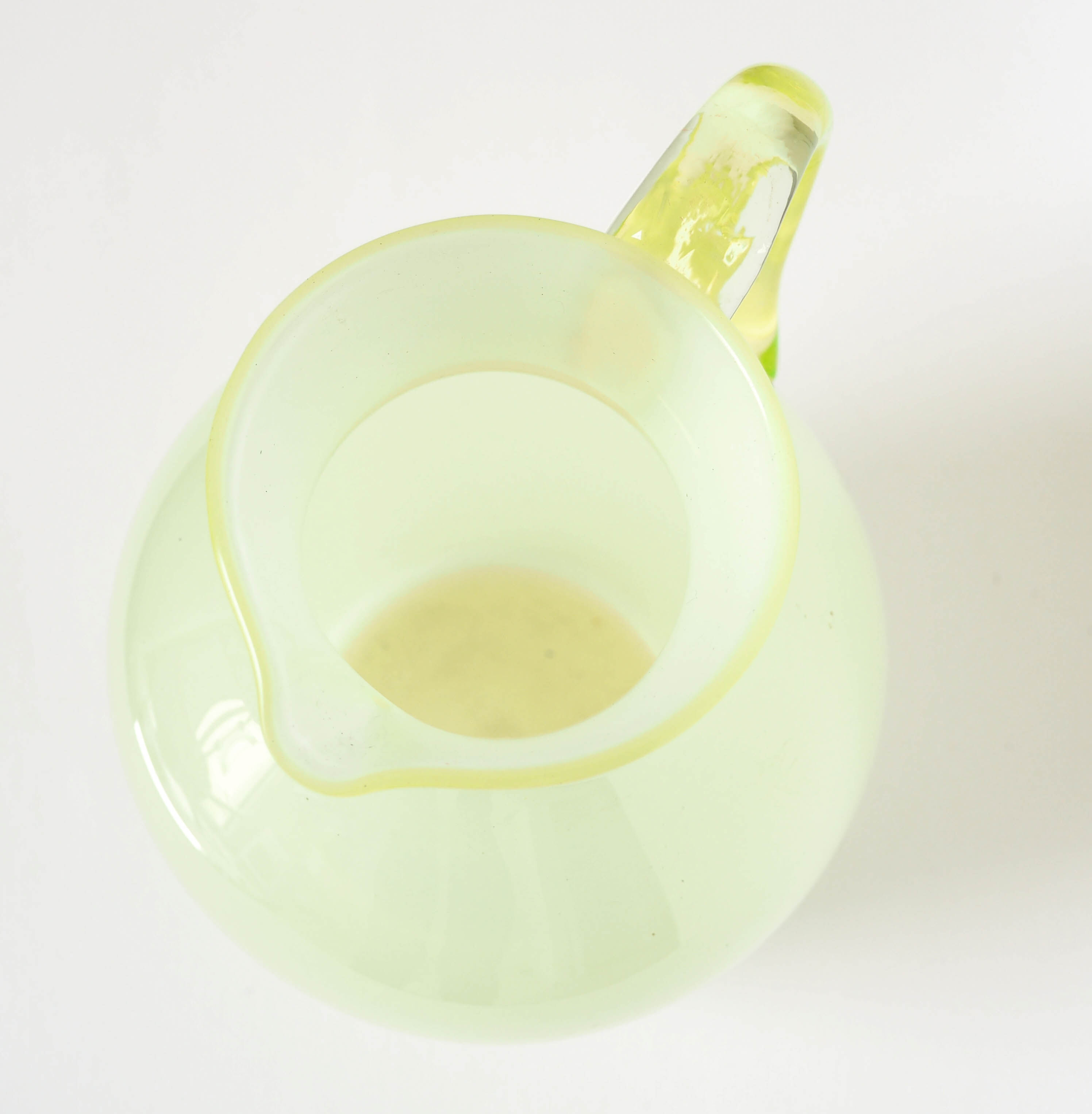 Opalescent glass pitcher