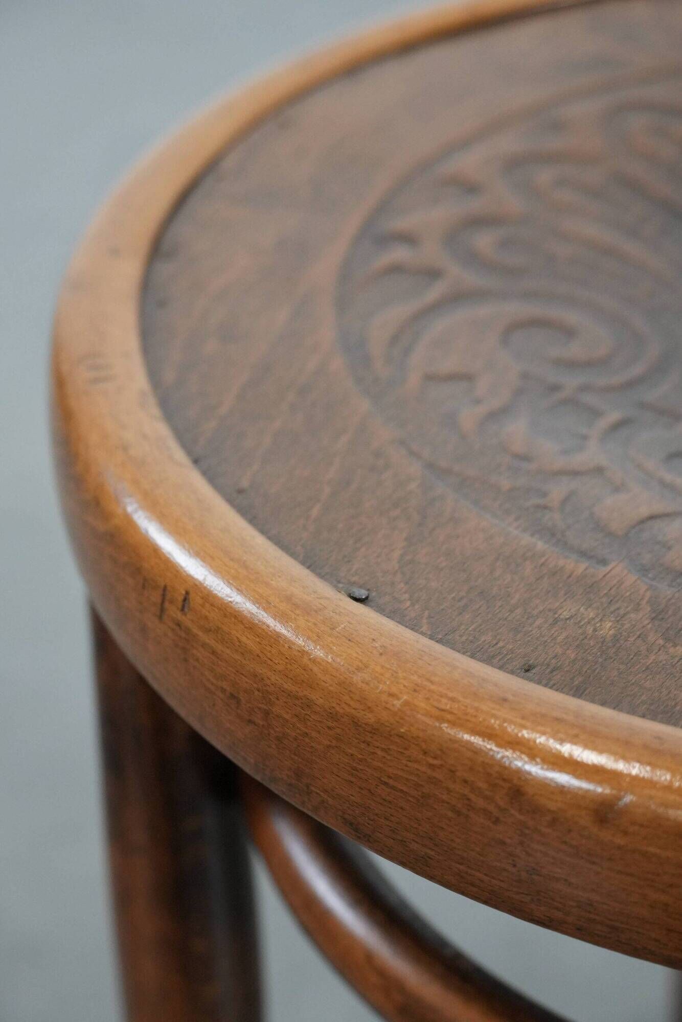 Antique bentwood stool from early 1900s with a seat with beautiful details