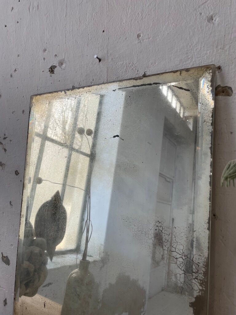 Very stung old bevelled mirror 39x60cm