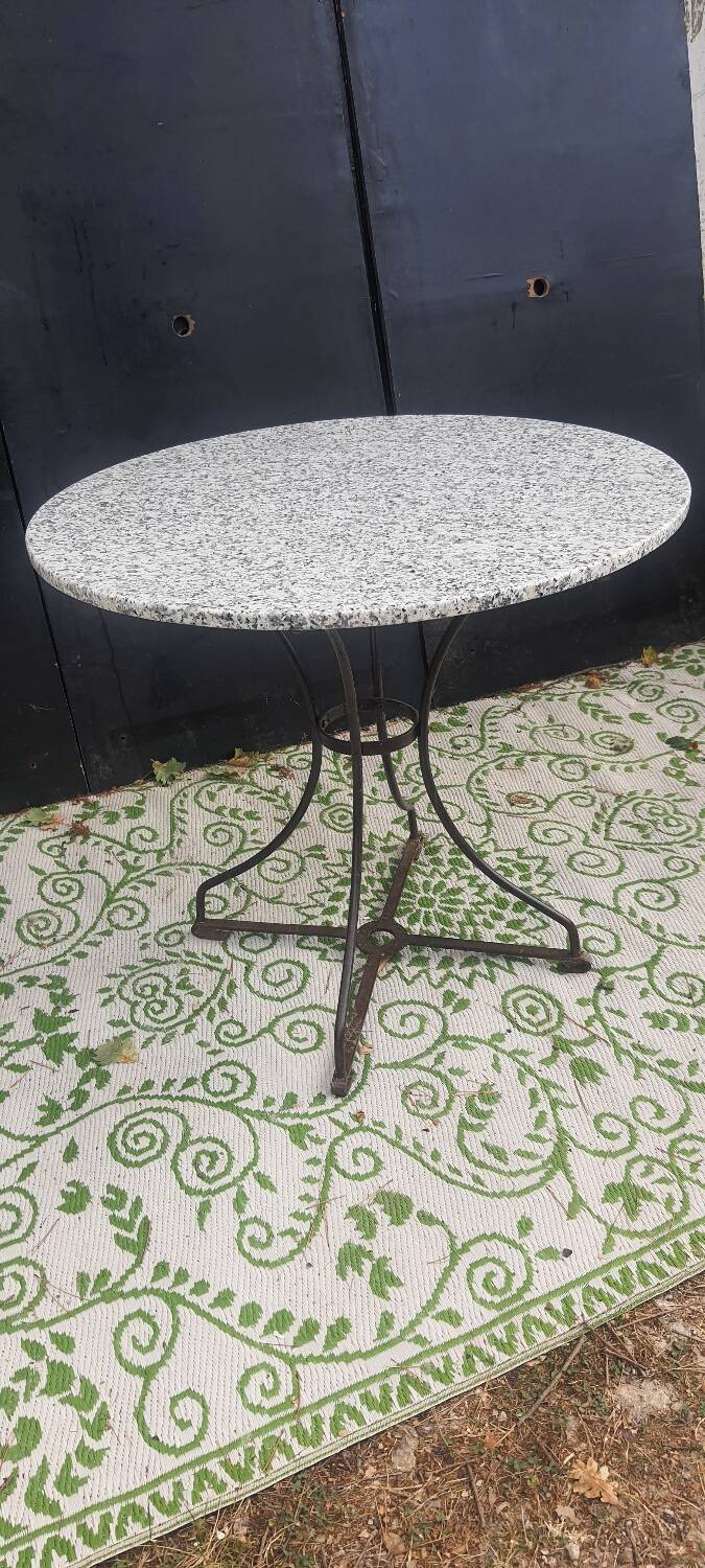Wrought iron pedestal table