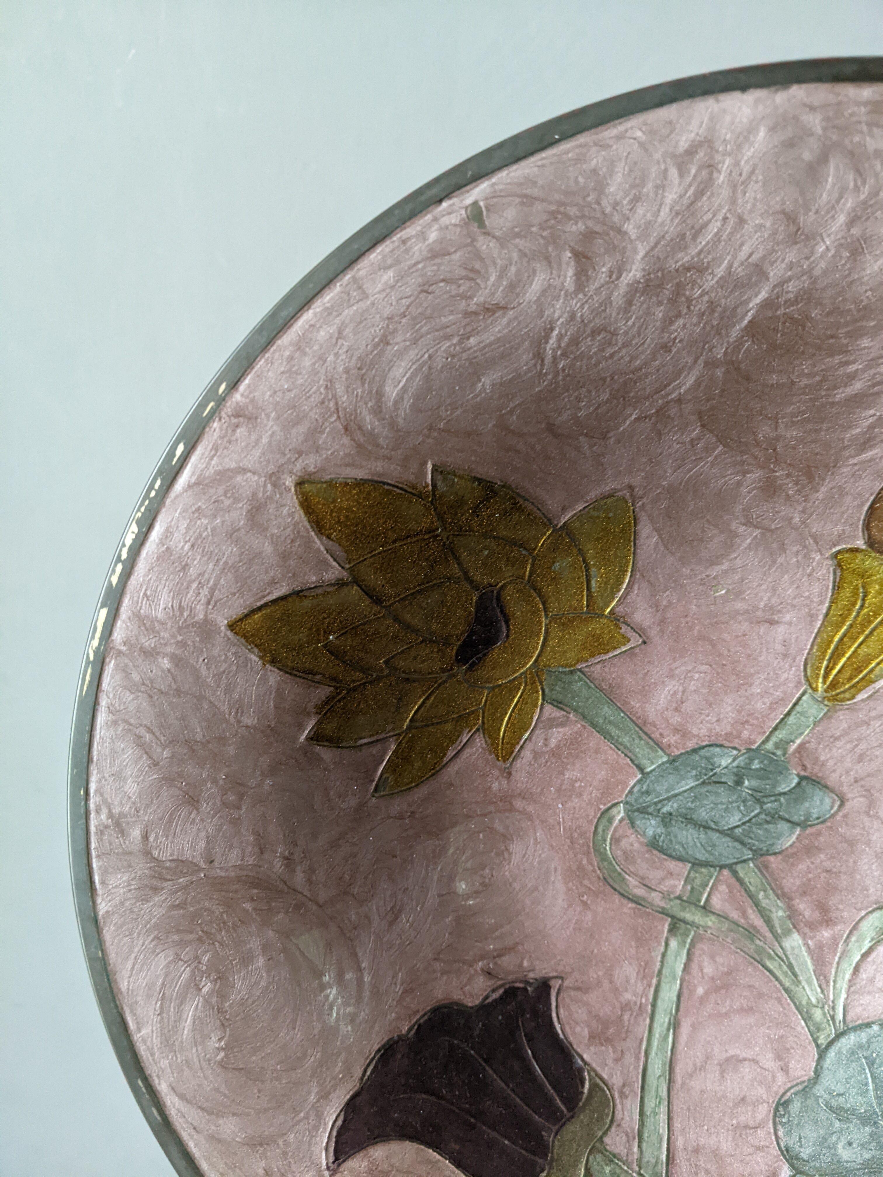 Brass bowl with hand-painted floral decoration, bohemian style.