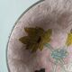 Brass bowl with hand-painted floral decoration, bohemian style.