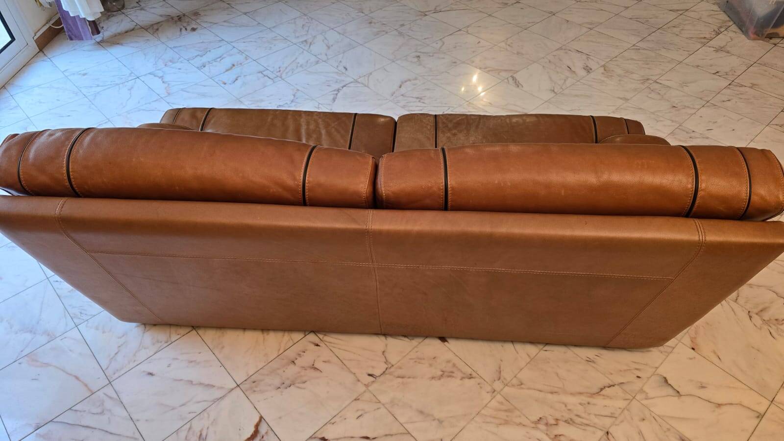 Three-seater leather sofa