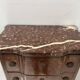Transitional style chest of drawers in rosewood and amaranth veneer, 20th century.