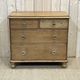 English chest of drawers in nineteenth century fir with its glass buttons