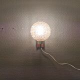 Wall light in rosewood with bobble glass ball shade.