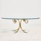 Table basse en laiton et verre