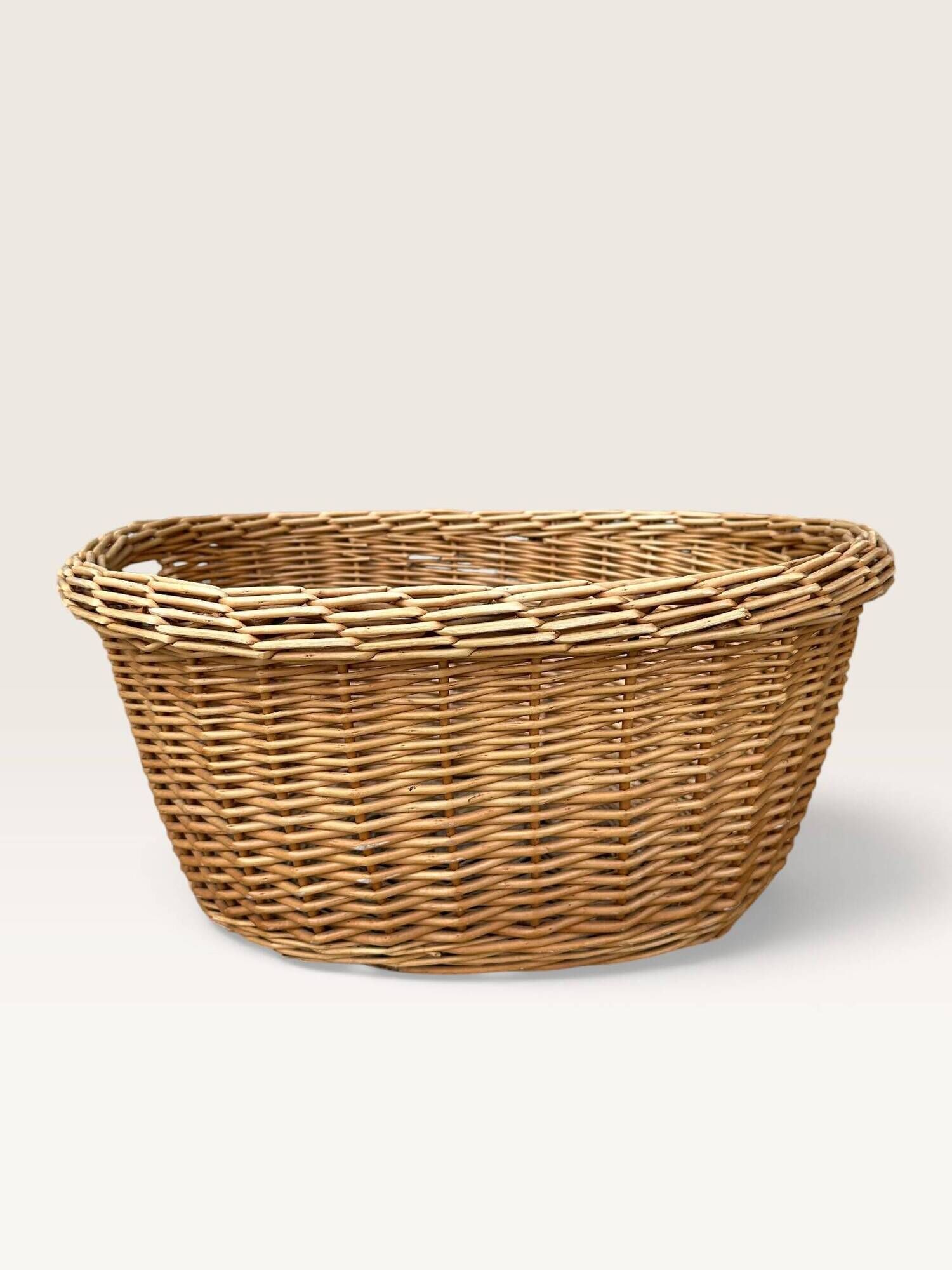 Woven blonde wicker basket