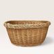 Woven blonde wicker basket