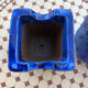 Set of two hanging pots in blue glazed ceramic.