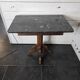 Old pedestal table with oak legs and marble top