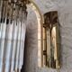 Brass wall light with crystal pendants