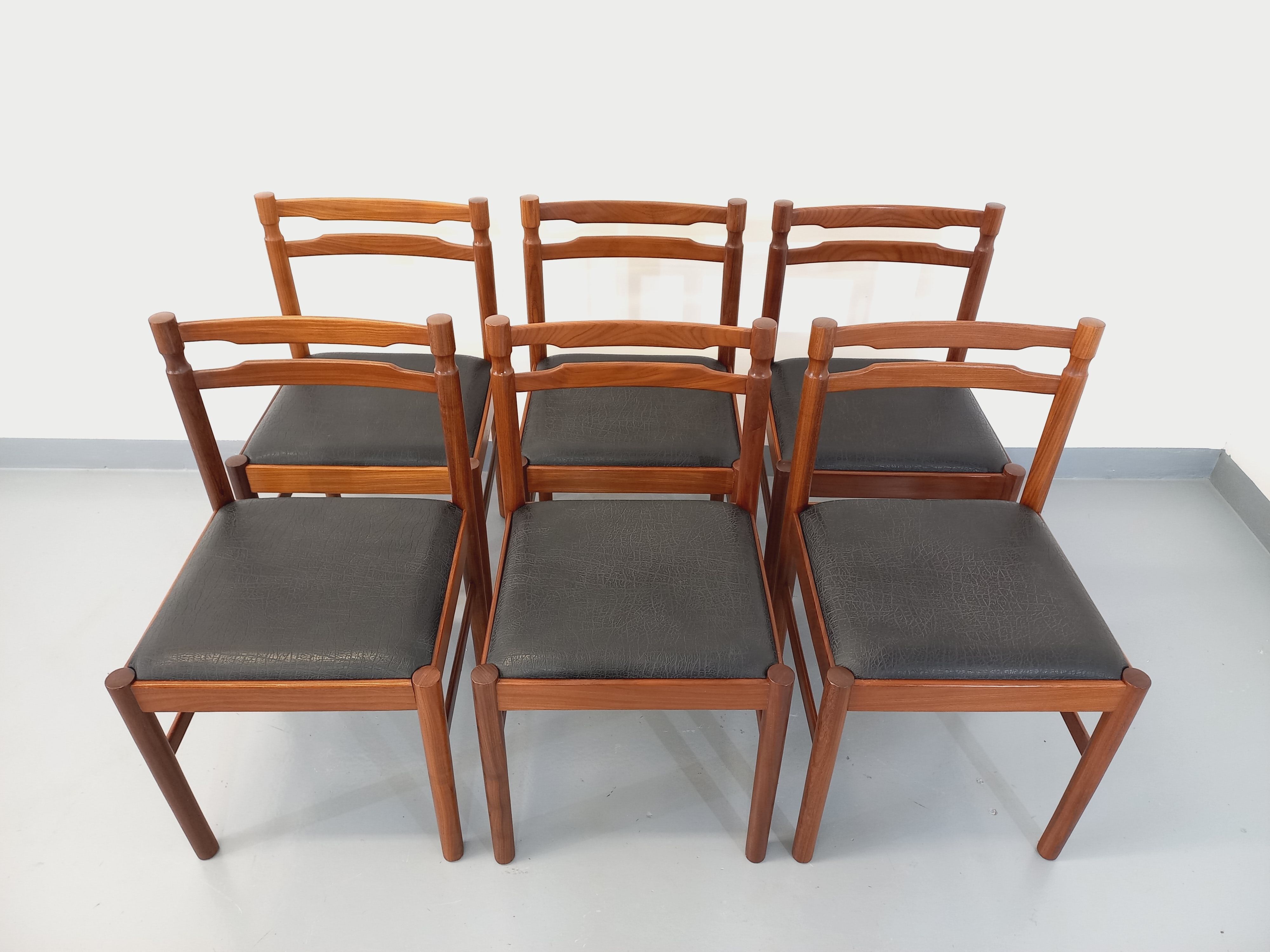Suite of 6 vintage Scandinavian teak and skai chairs from the 60s