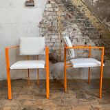 Pair of postmodern orange armchairs and bouclé wool fabric