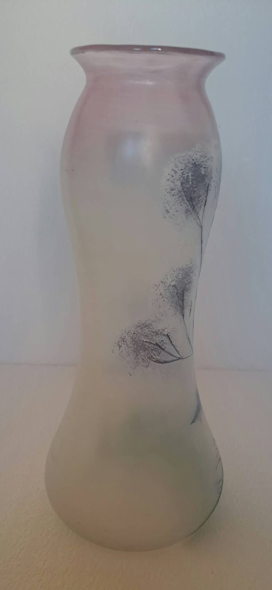Frosted glass vase enhanced by hand