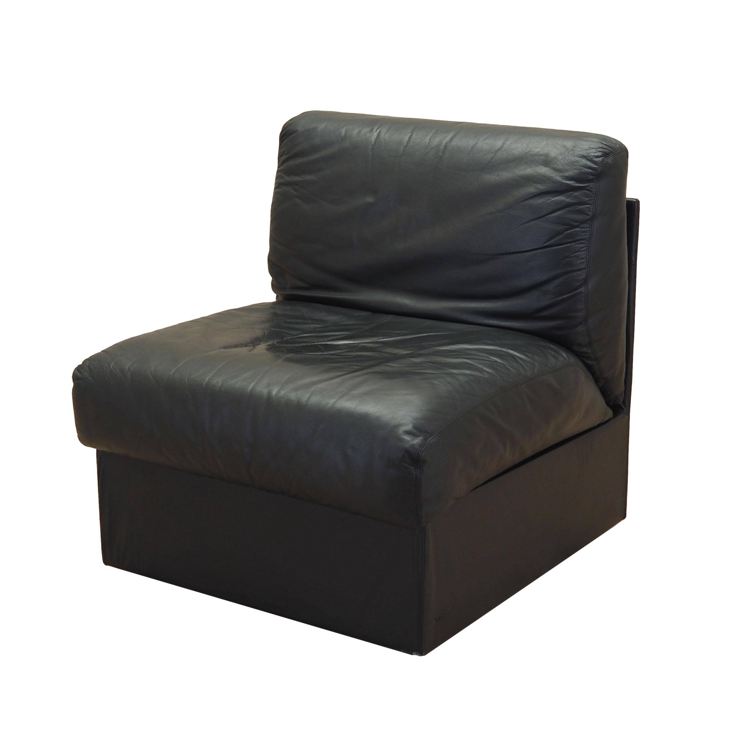 Black leather pouffe/armchair, Italian design, 1960s, production: Italy