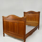 Art Nouveau twin beds in carved solid oak, France, circa 1910