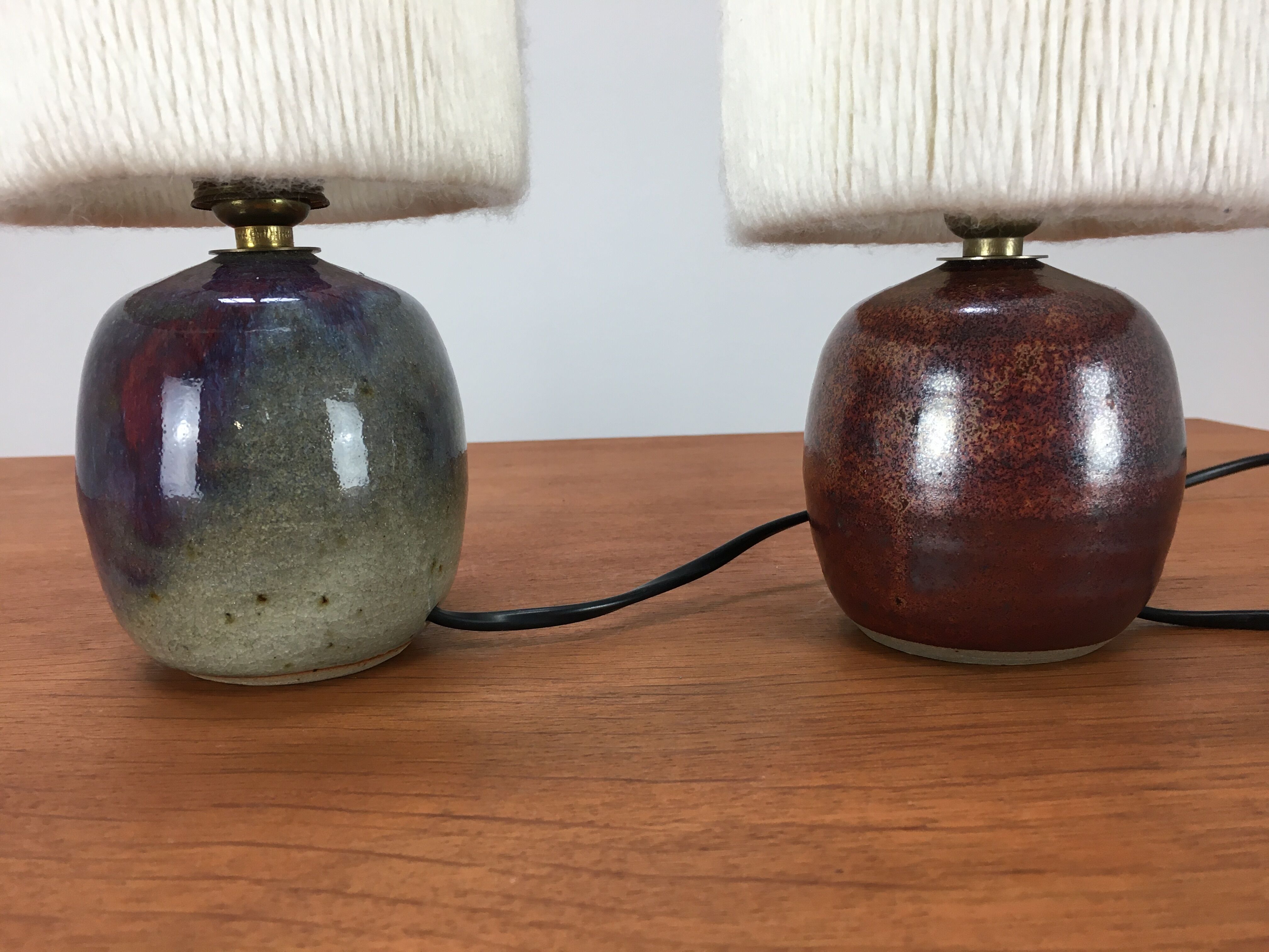 Pair of ceramic sandstone ball lamps and wool lampshades