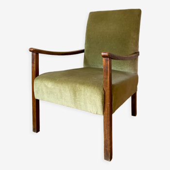 Vintage green velvet armchair