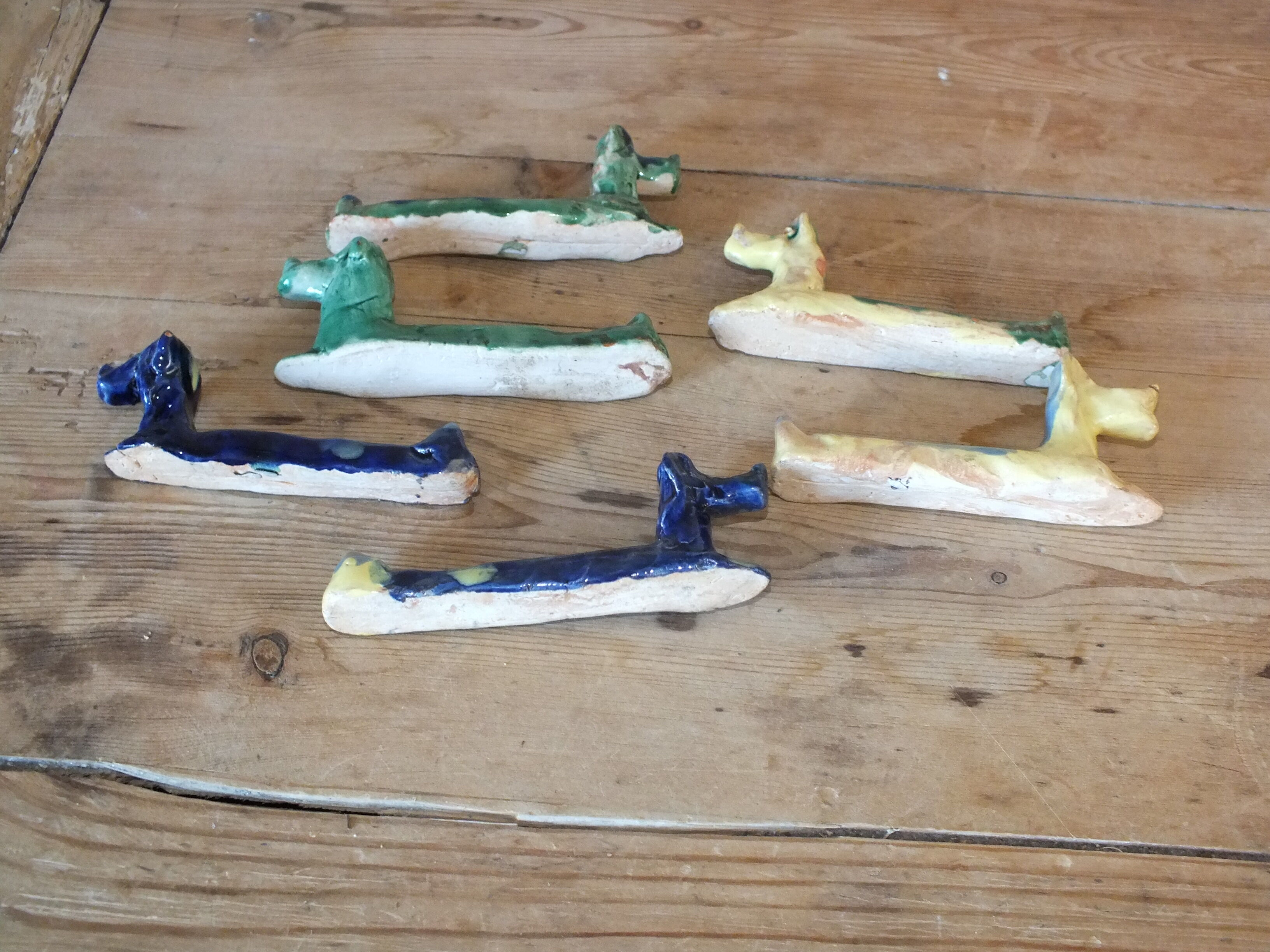 6 knife-wielding colorful ceramic dogs 60s