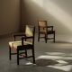 Pair of modernist armchairs in solid oak, France, circa 1940.