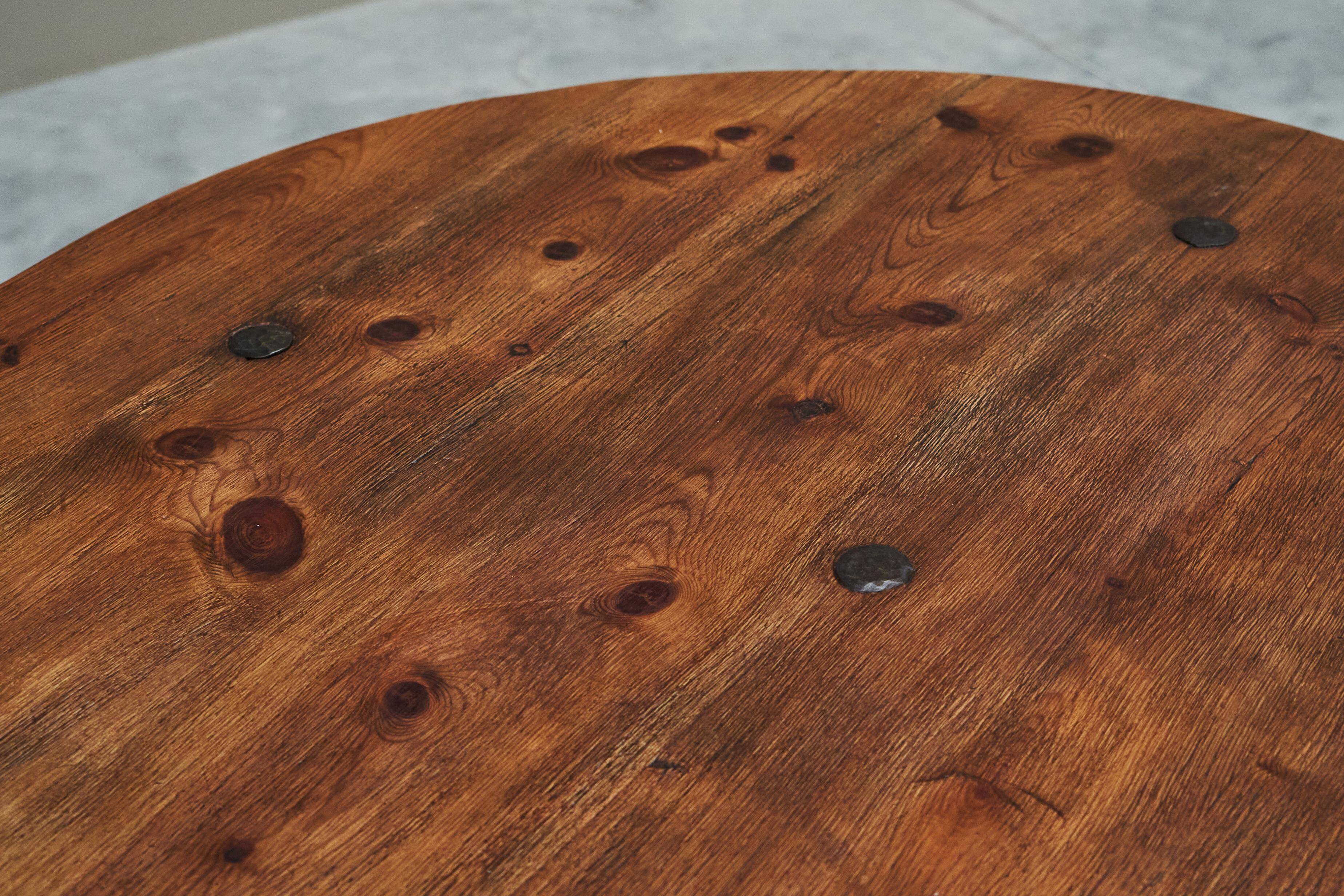 Dining table or Spanish centre table in solid wood and wrought iron from the mid-20th century.