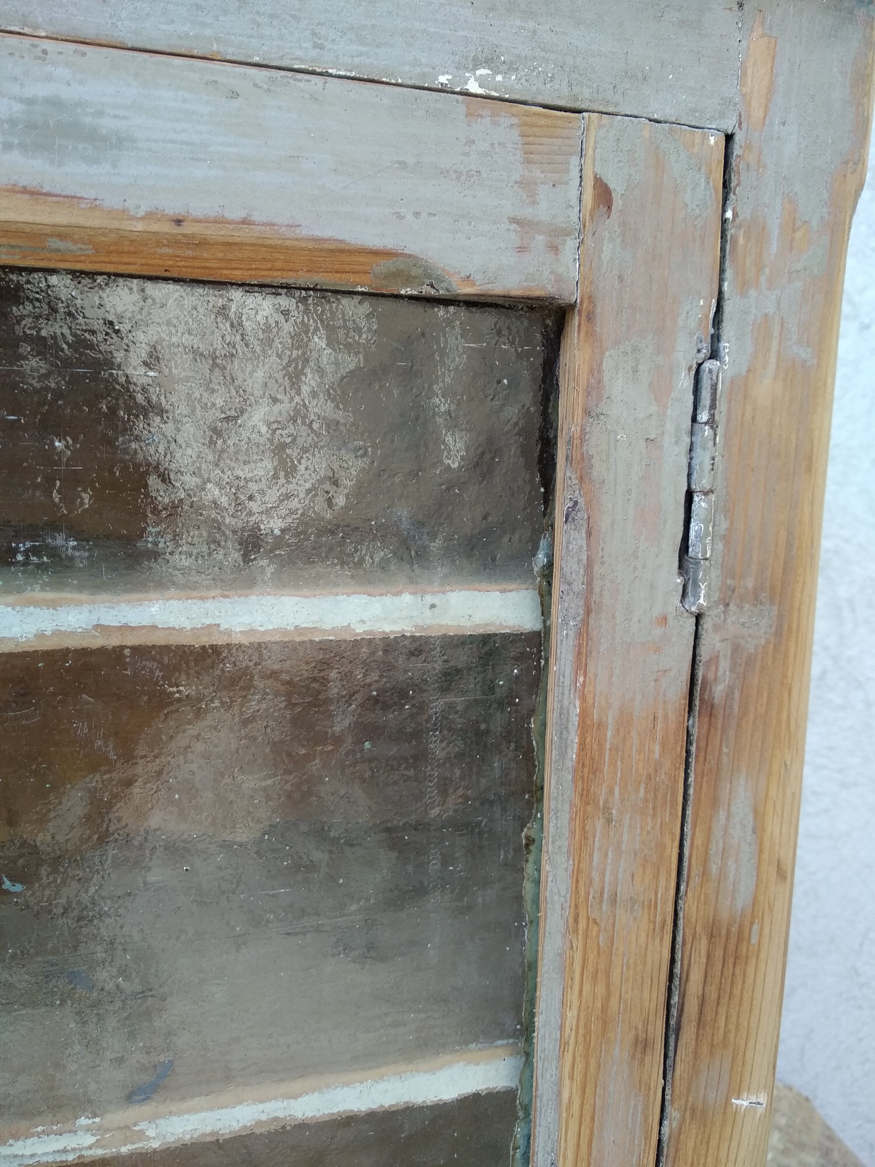 Antique wooden bathroom cabinet patinated