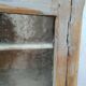 Antique wooden bathroom cabinet patinated