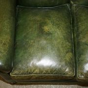 Victorian leather canapé, shield armrests, stamped Maple & Co.