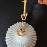 Round pendant light in pleated semi-opaque glass