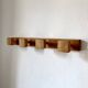 Wall-mounted coat rack with 4 wooden hooks