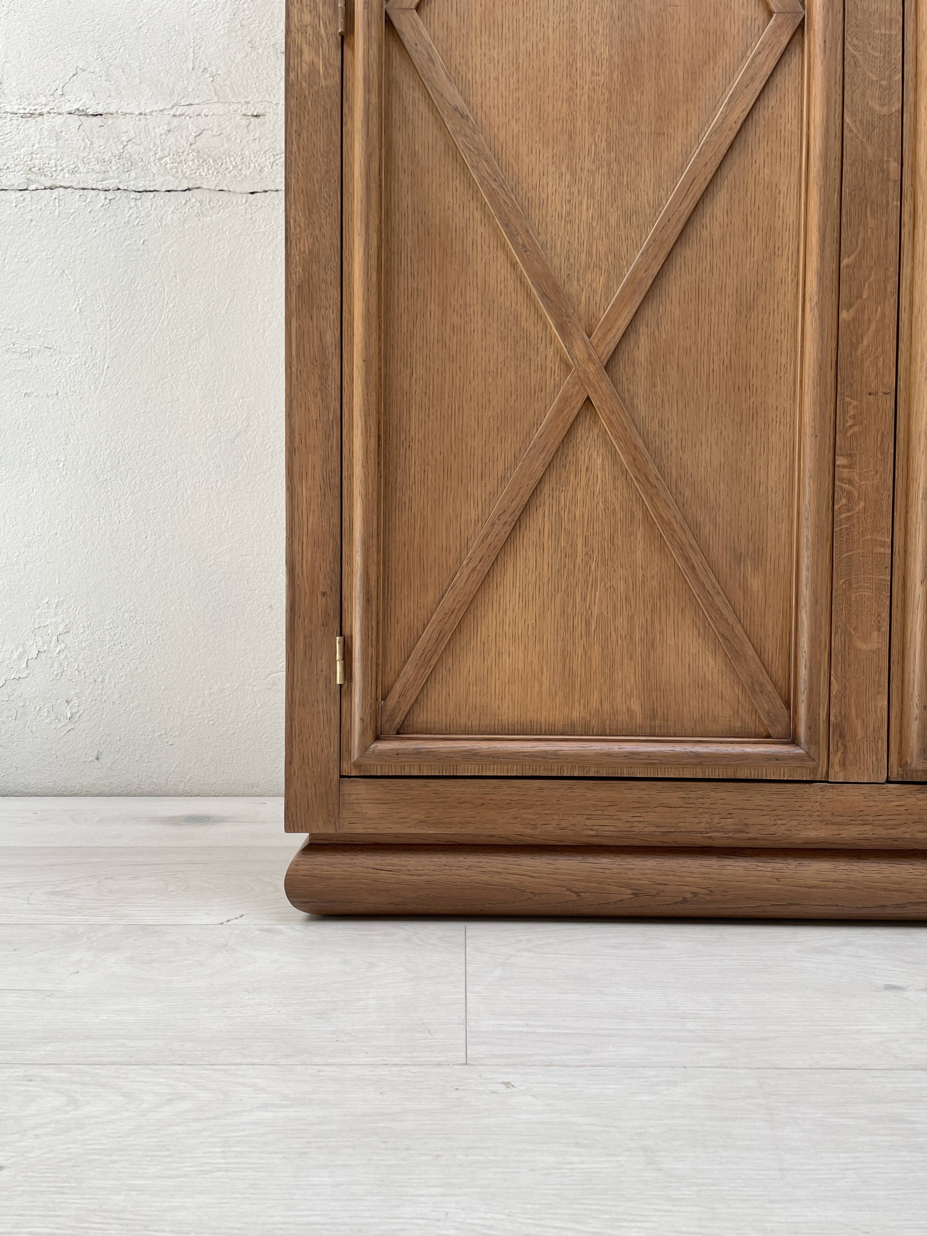 Storage unit in solid oak and veneer, circa 1960.