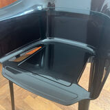 "Papyrus" black armchairs designed by Ronan and Erwan Bouroullec.